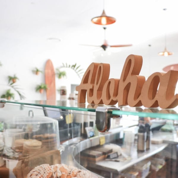 A photo of an "Aloha" sign in a restaurant in Hawaii.