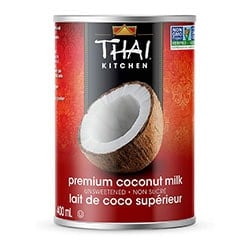 Canned coconut milk with a white background