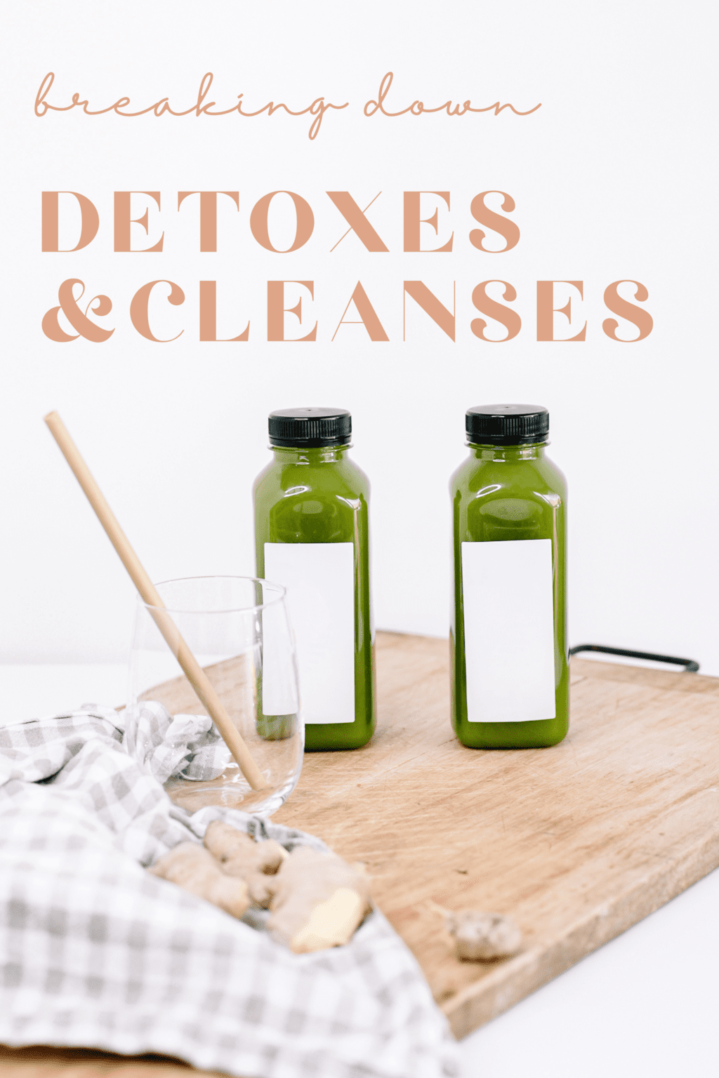 Two bottles of green juice are on a cutting board with text "breaking down detoxes & cleanses" above it