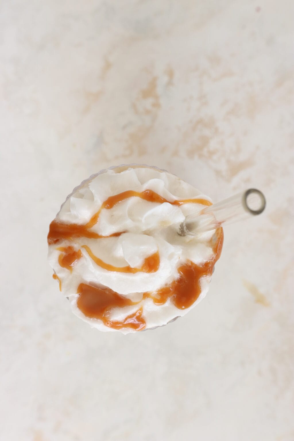 Whipped cream with caramel drizzle.