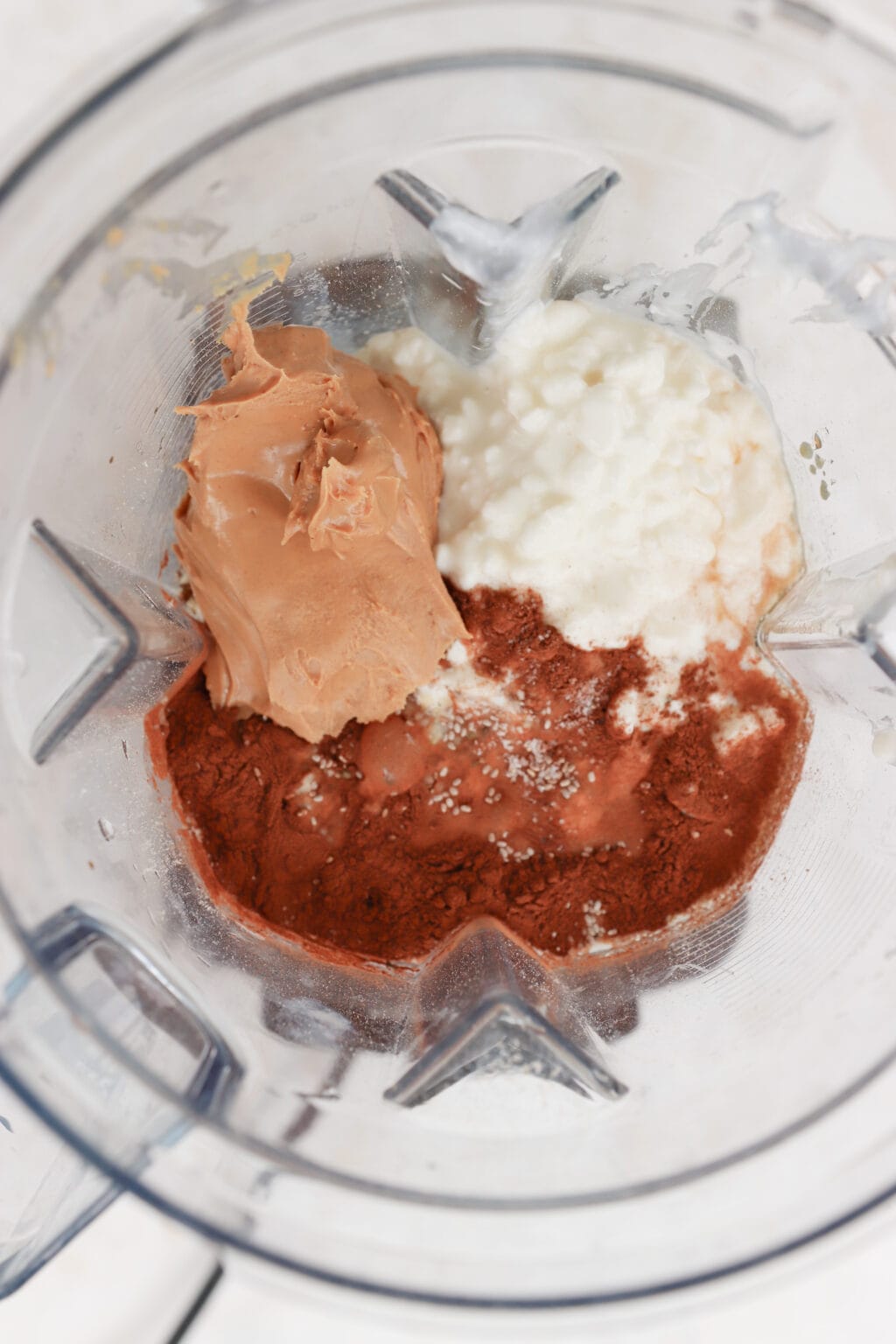 Ingredients for High Protein Cottage Cheese Blended Overnight Oats added to a blender
