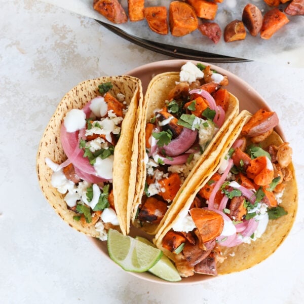 Roasted White Bean and Sweet Potato Tacos with Lime Crema