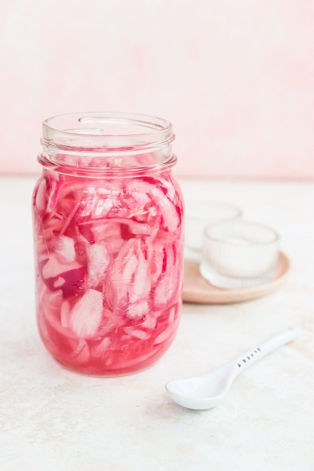 Quick pickled red onion in a glass jar