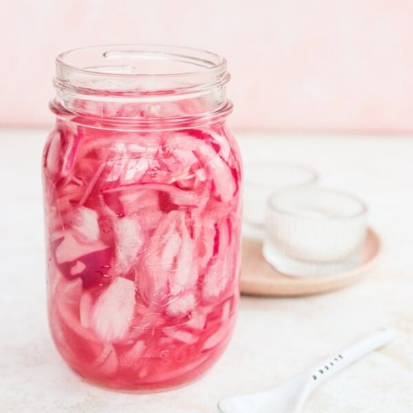 Quick pickled red onion in a glass jar