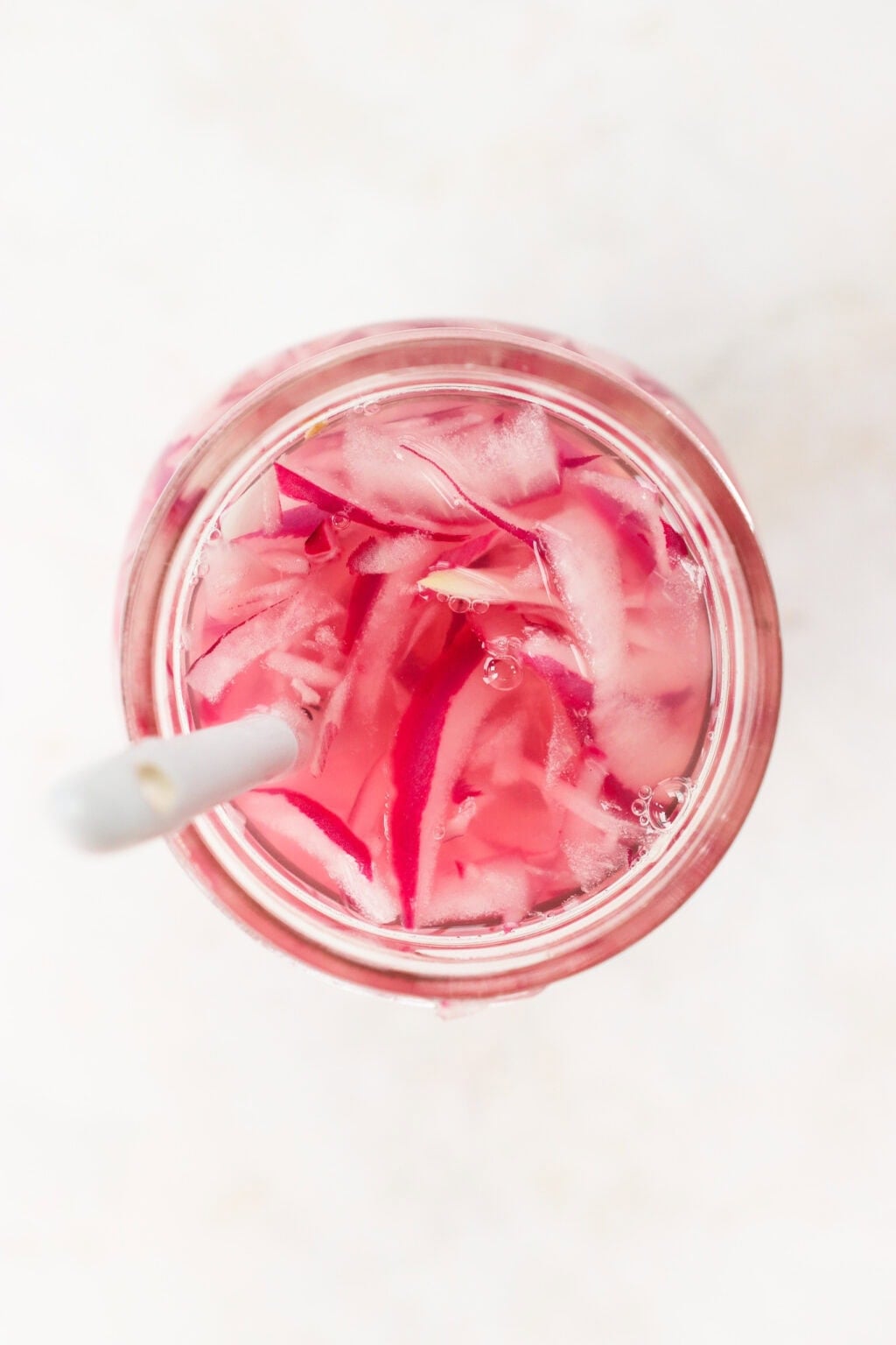 Quick pickled red onion in a glass jar