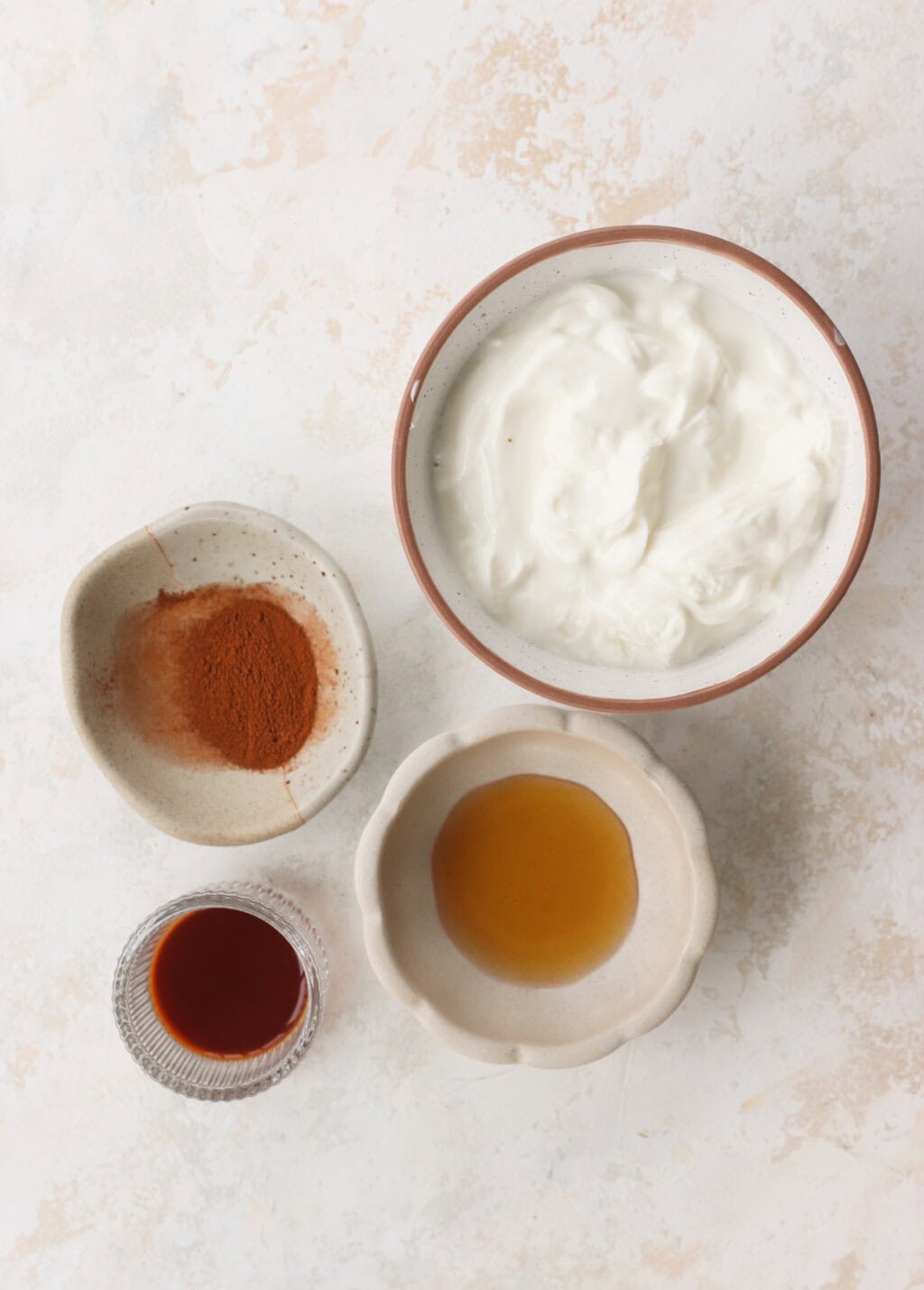 Ingredients for the Best Honey-Cinnamon Greek Yogurt Fruit Dip (easy high protein snack) including Greek yogurt, honey, cinnamon, and vanilla extract
