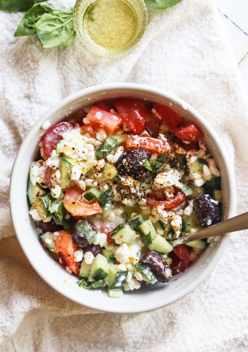 Easy Greek-Inspired Cottage Cheese Salad in a white bowl