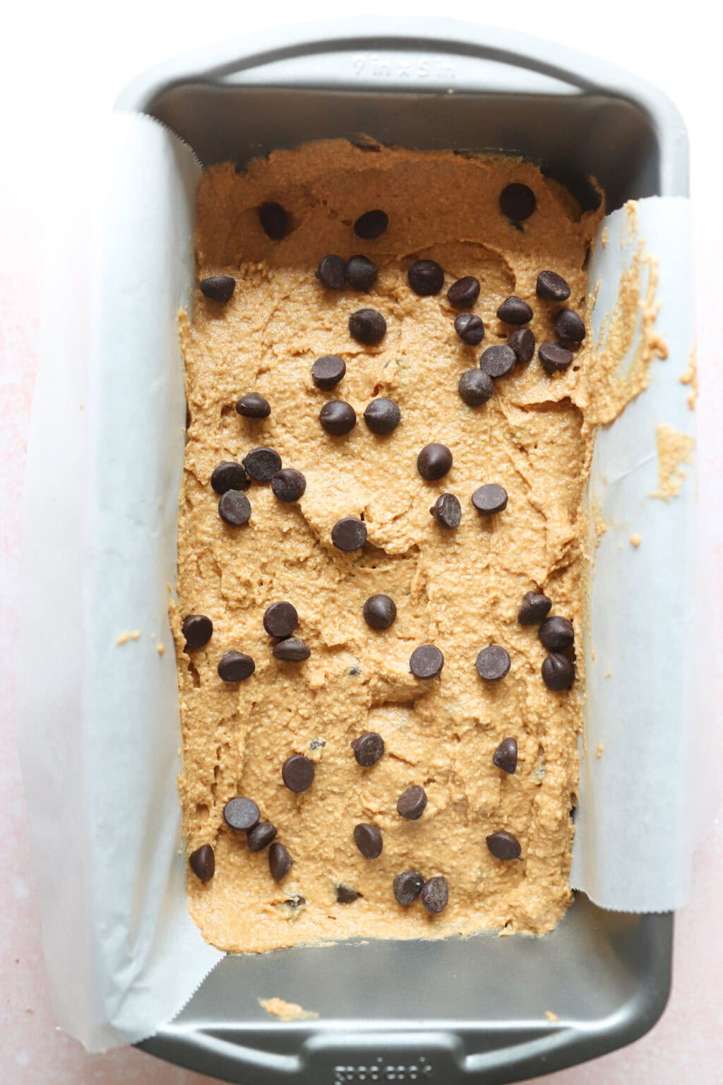 Ingredients for for Easy Oat Flour Pumpkin Bread with Chocolate Chips in a bread form