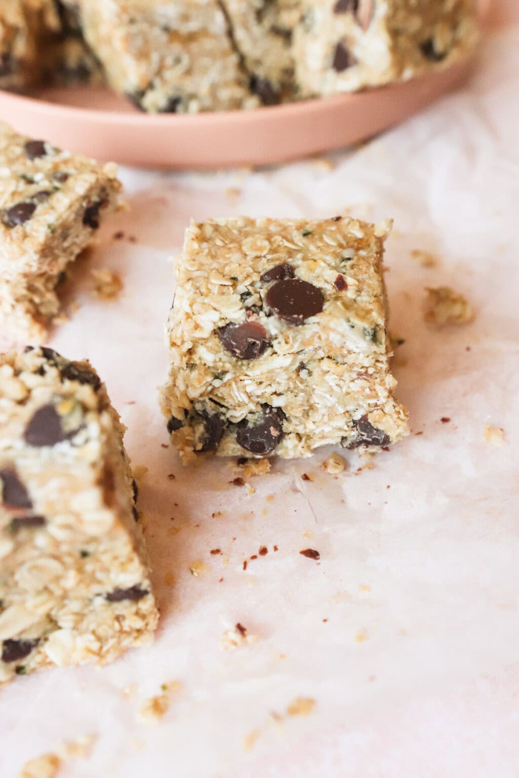 Better Than Store Bought Heavenly Hunks sliced and resting on a counter with a pink plate in the background