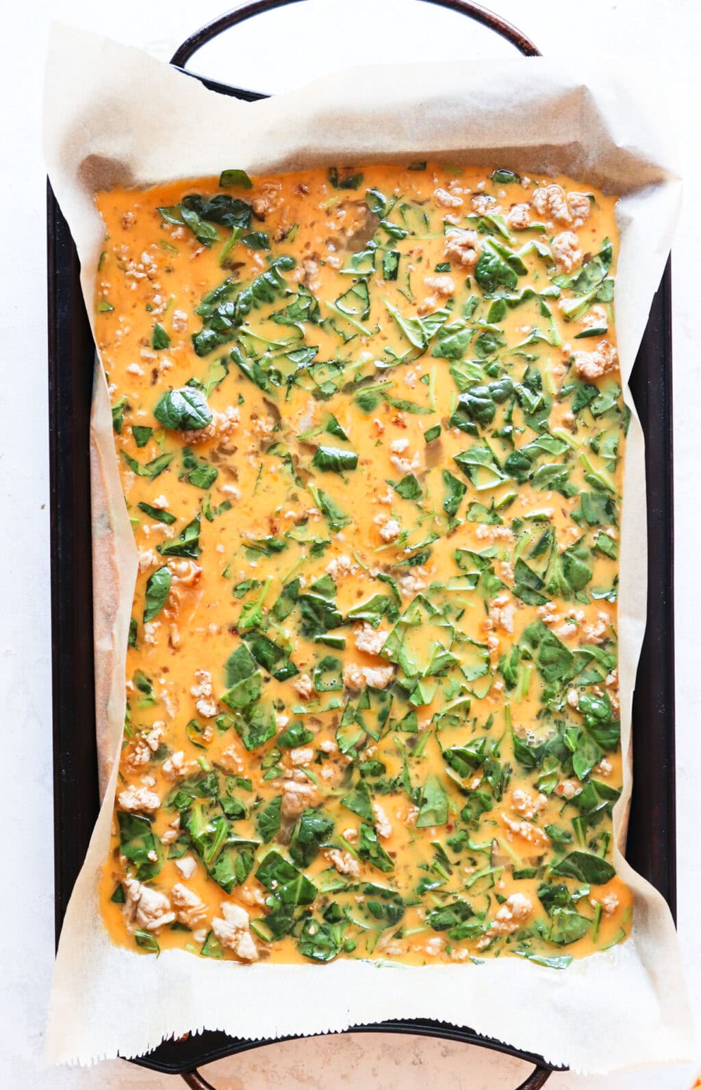 the egg bake, before going into the oven on a baking sheet