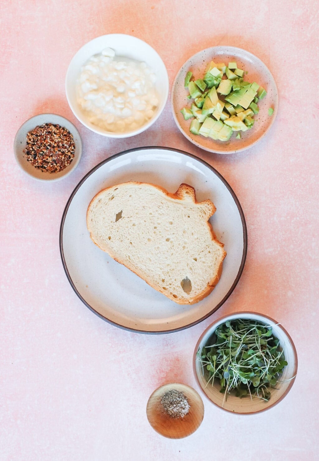 overhead shot of all the ingredients for the cottage cheese avocado toast
