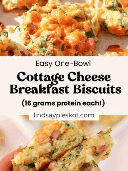 A close-up of cheesy, golden-brown protein biscuits made with cottage cheese, herbs, and diced vegetables. Text reads: “Easy One-Bowl Cottage Cheese Protein Biscuits (16 grams protein each!).” A hand holds a split biscuit.