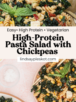 A vibrant high protein pasta salad with chickpeas, kale, corn, sun-dried tomatoes, and fresh basil is served in bowls on a pink surface, with lemon wedges and a small bowl of salt on the side. Text reads: “High-Protein Pasta Salad with Chickpeas.”.
